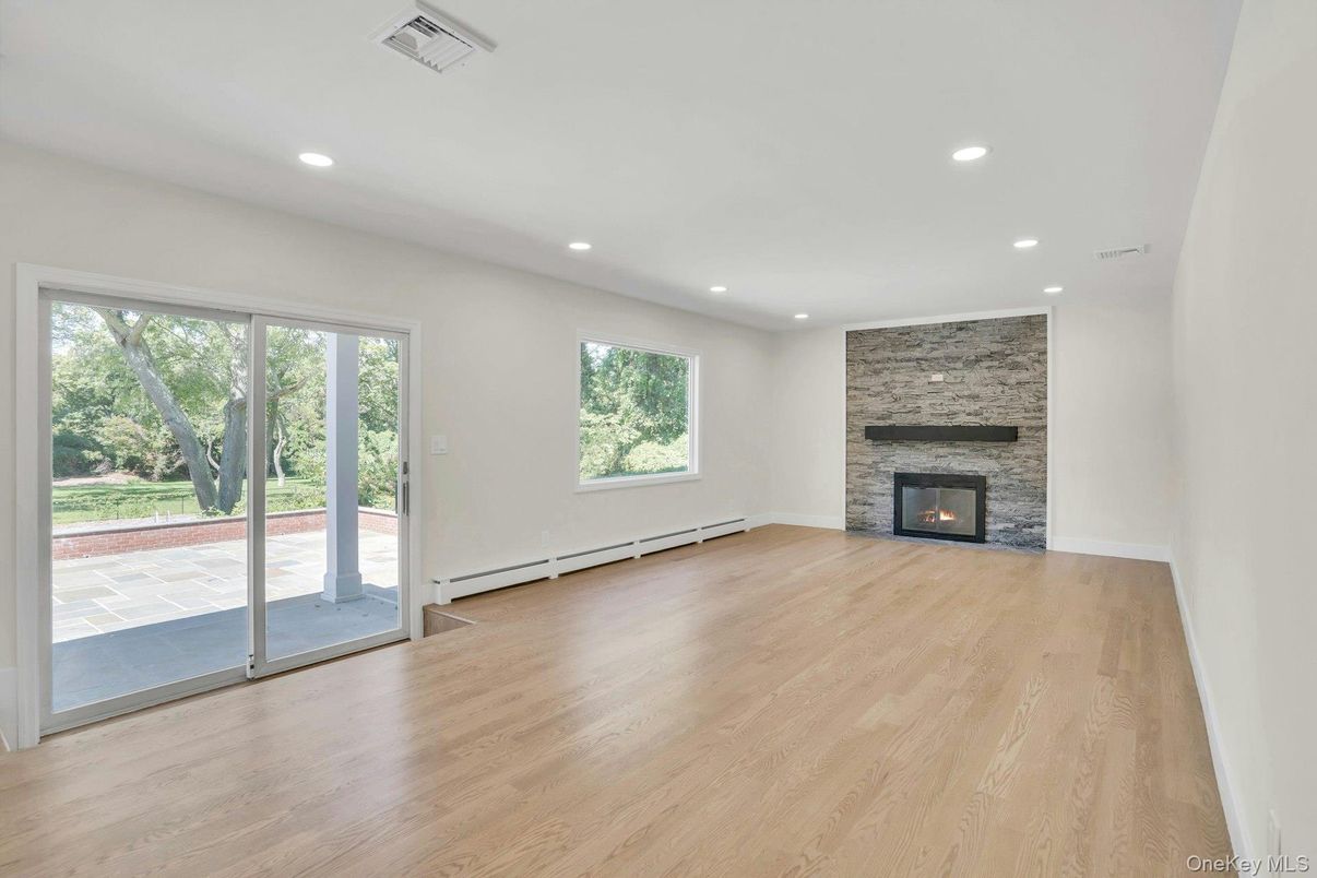 Empty room, Fireplace, Interior, Recessed Lighting, Wood Texture Flooring