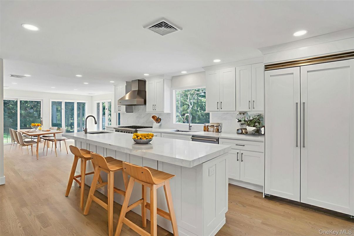 Dining room, Interior, Kitchen, Recessed Lighting, Stainless Steel Appliances, Wood Texture Flooring