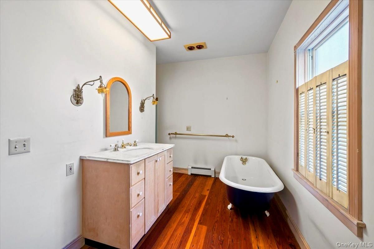 Bathroom, Dual Sink Vanities, Free Standing Baths, Interior, Wood Texture Flooring
