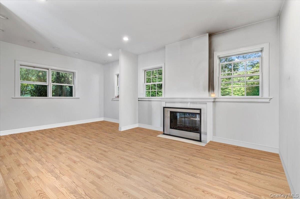 Empty room, Fireplace, Interior, Recessed Lighting, Wood Texture Flooring