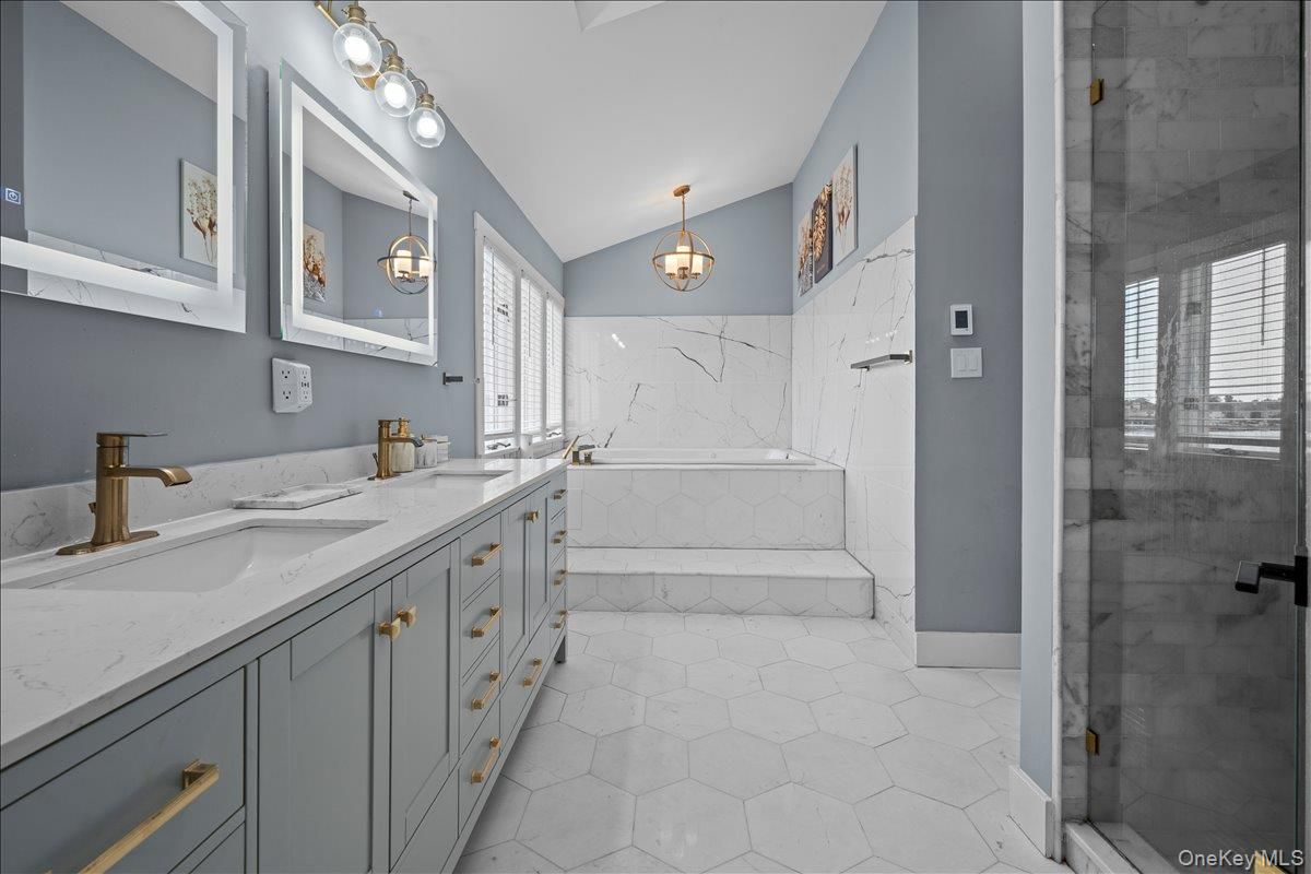 Bathroom, Dual Sink Vanities, Glass Shower, Interior, Marble Walls, Pendant Lights