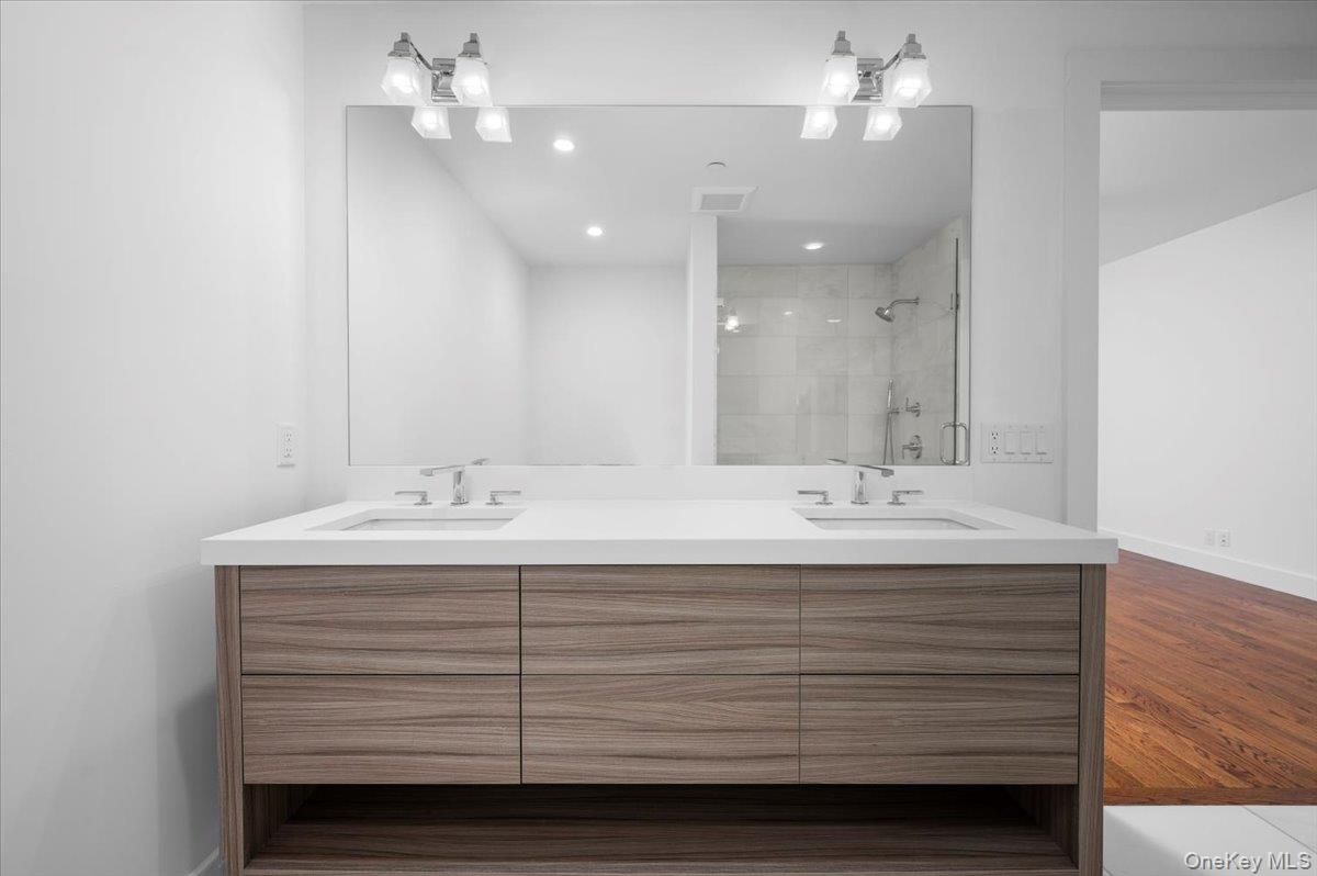 Bathroom, Dual Sink Vanities, Interior, Recessed Lighting, Wood Texture Flooring