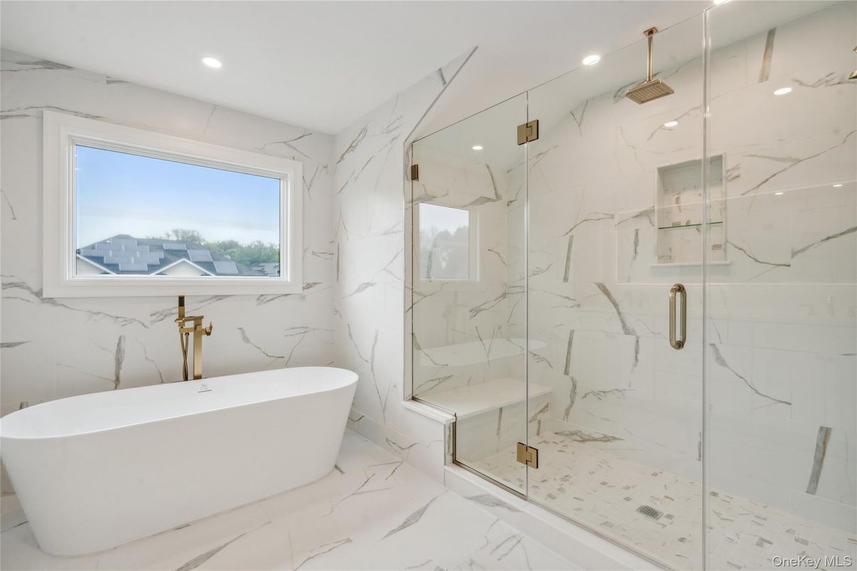 Bathroom, Free Standing Baths, Glass Shower, Interior, Marble, Marble Walls, Recessed Lighting