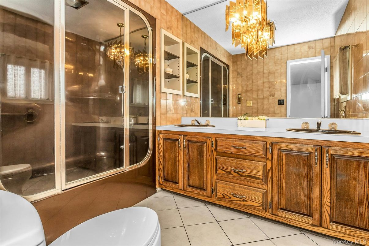 Bathroom, Chandelier, Dual Sink Vanities, Glass Shower, Interior