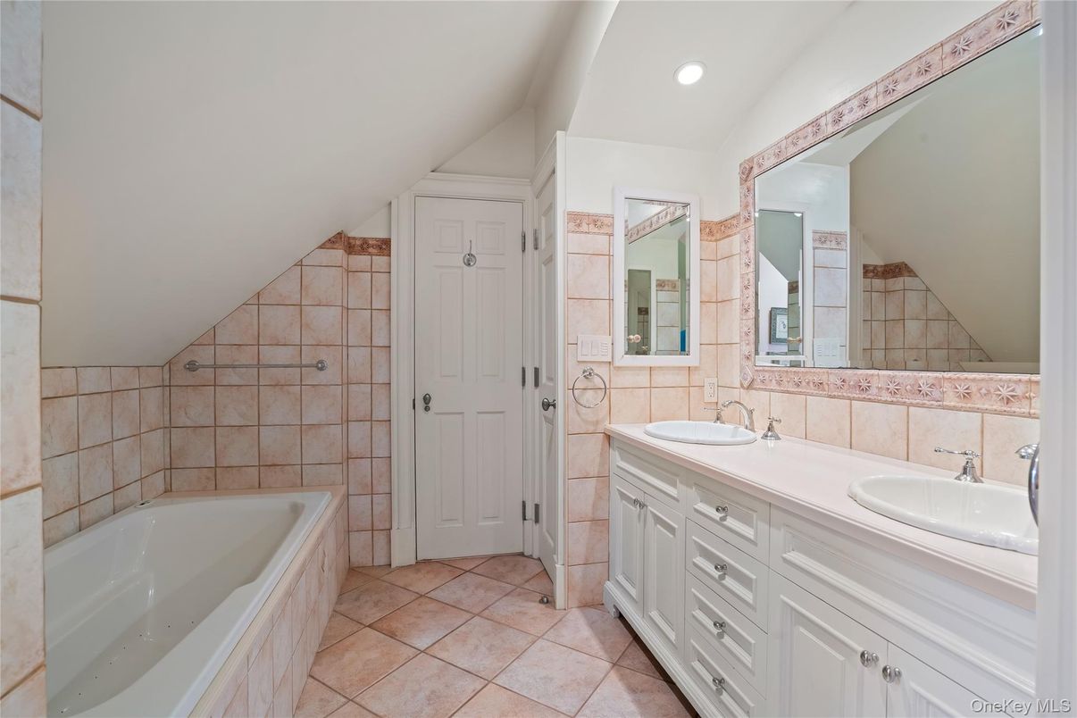 Bathroom, Dual Sink Vanities, Interior, Recessed Lighting, Tile Countertops