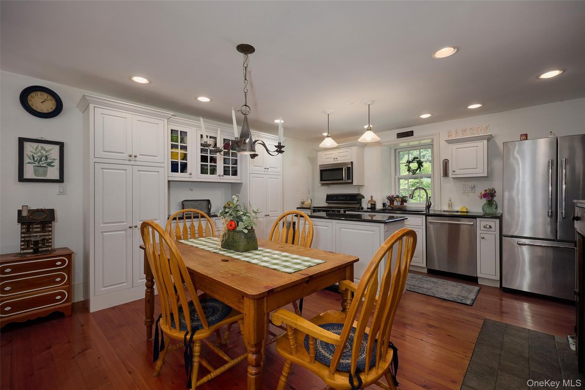 Dining room, Interior, Kitchen, Pendant Lights, Recessed Lighting, Stainless Steel Appliances, Wood Texture Flooring