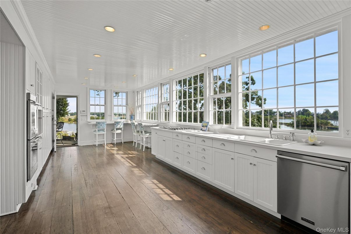Dining room, Interior, Kitchen, Recessed Lighting, Stainless Steel Appliances, Wood Texture Flooring