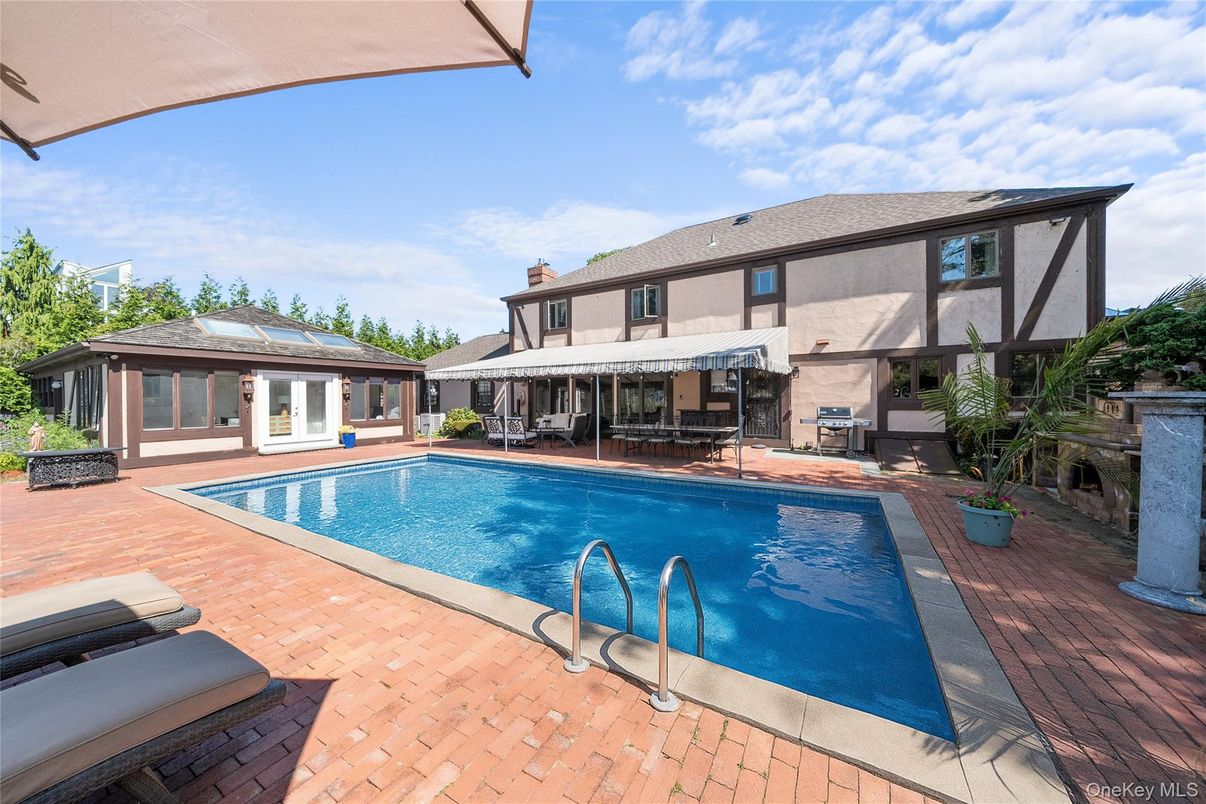 Exterior, Pool, Solar Panels