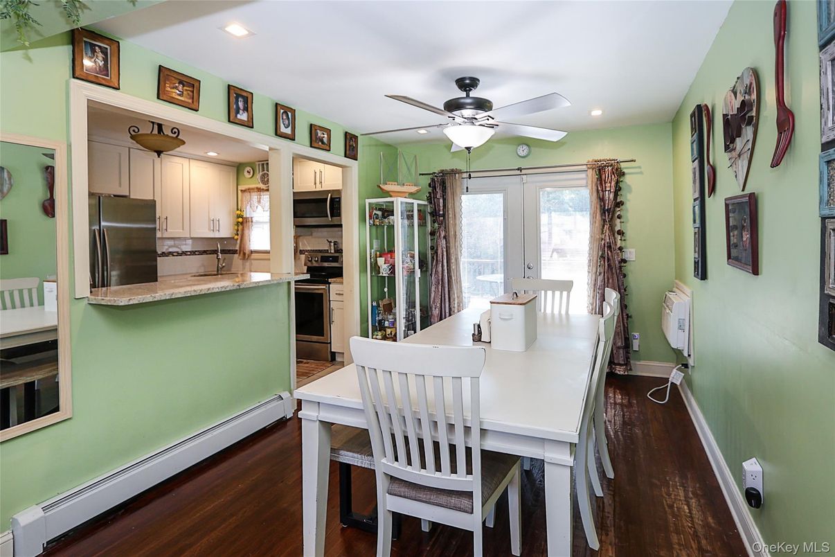 Dining room, Interior, Kitchen, Recessed Lighting, Stainless Steel Appliances, Wood Texture Flooring