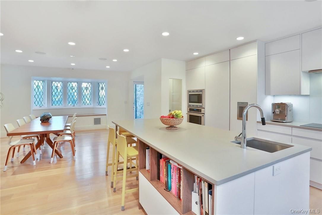 Dining room, Interior, Kitchen, Recessed Lighting, Stainless Steel Appliances, Wood Texture Flooring