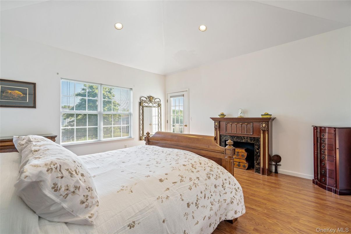 Bedroom, Fireplace, Interior, Recessed Lighting, Wood Texture Flooring