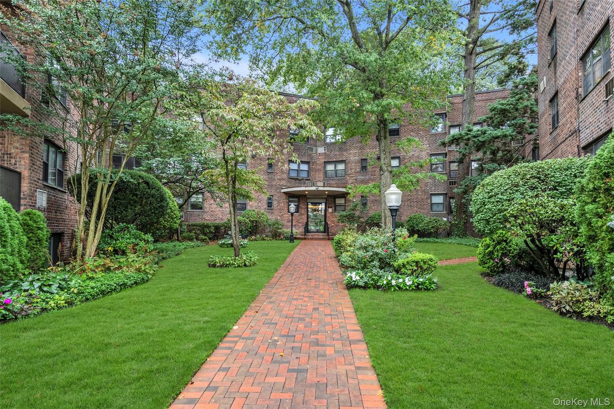 Exterior, Facade, Brick Facade, Condo Building