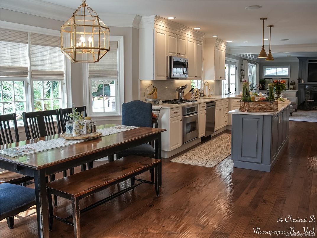 Dining room, Interior, Kitchen, Pendant Lights, Recessed Lighting, Stainless Steel Appliances, Wood Texture Flooring