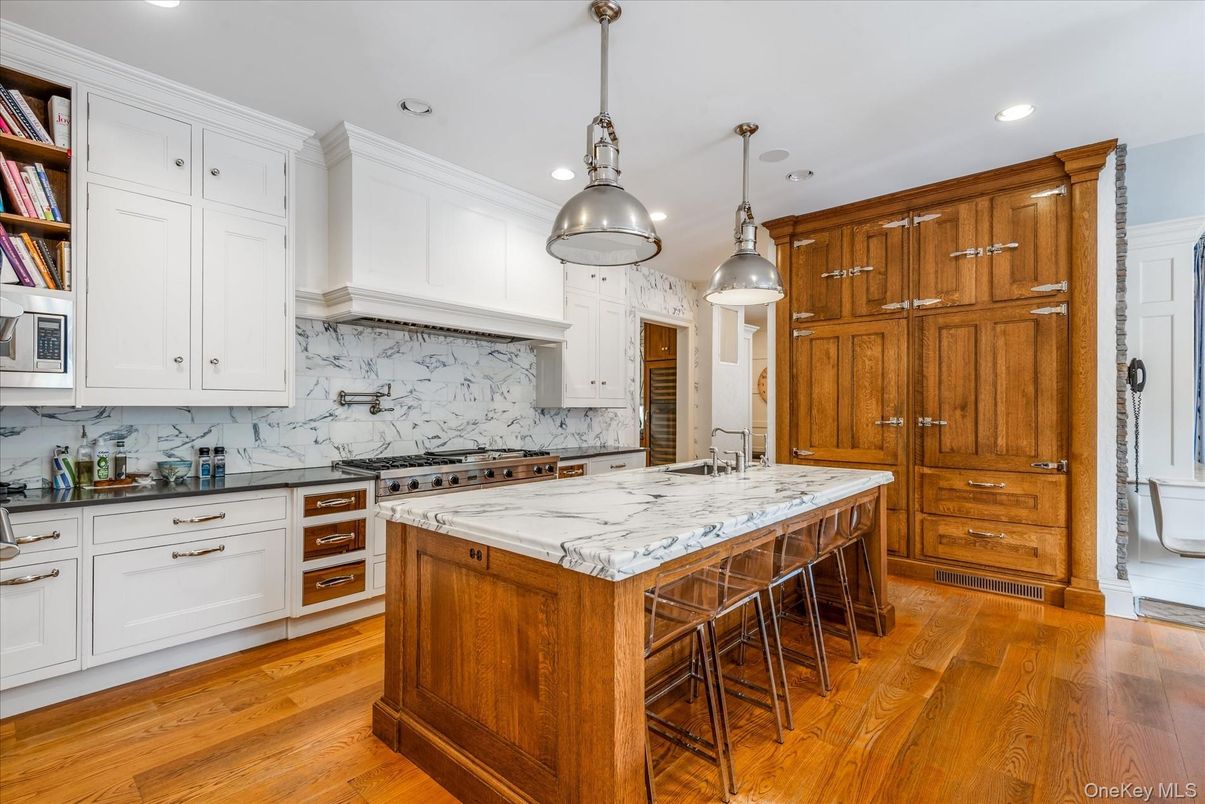 Interior, Kitchen, Marble Walls, Pendant Lights, Recessed Lighting, Wood Texture Flooring