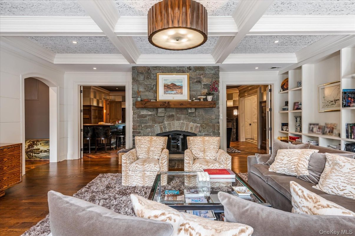 Fireplace, Interior, Living room, Piano, Recessed Lighting, Stone Walls, Wood Texture Flooring