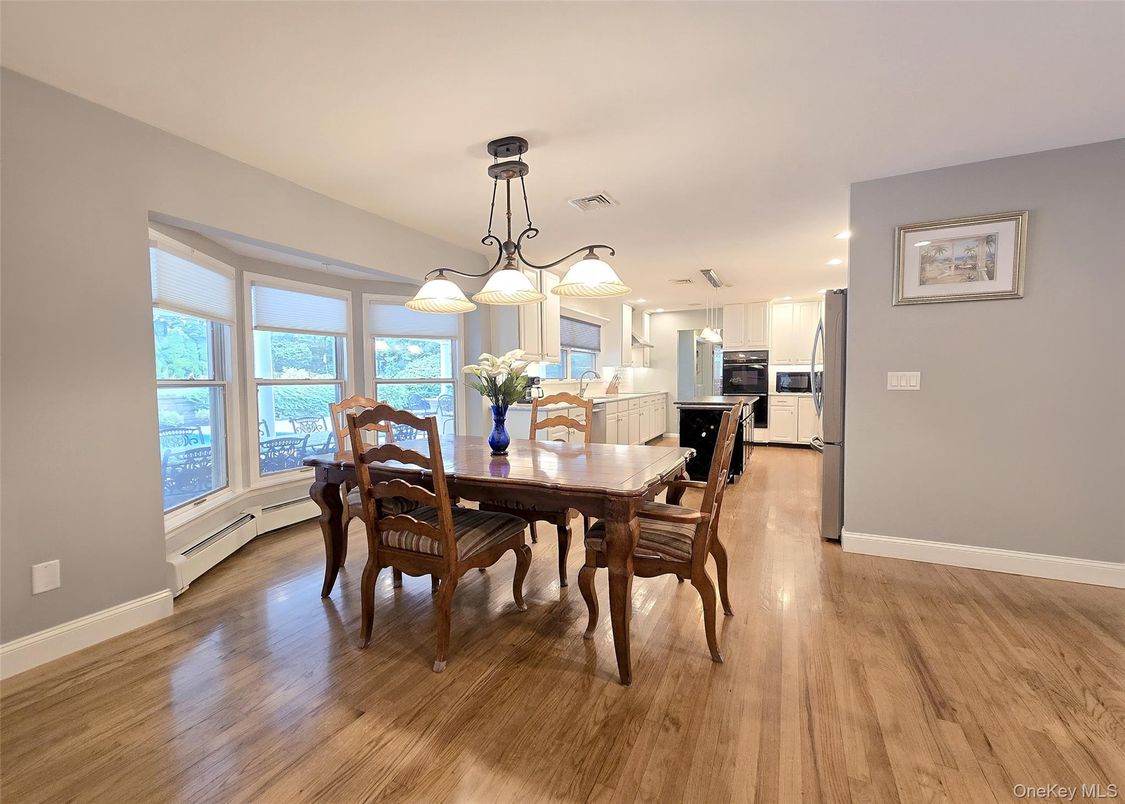Dining room, Interior, Kitchen, Pendant Lights, Recessed Lighting, Stainless Steel Appliances, Wood Texture Flooring
