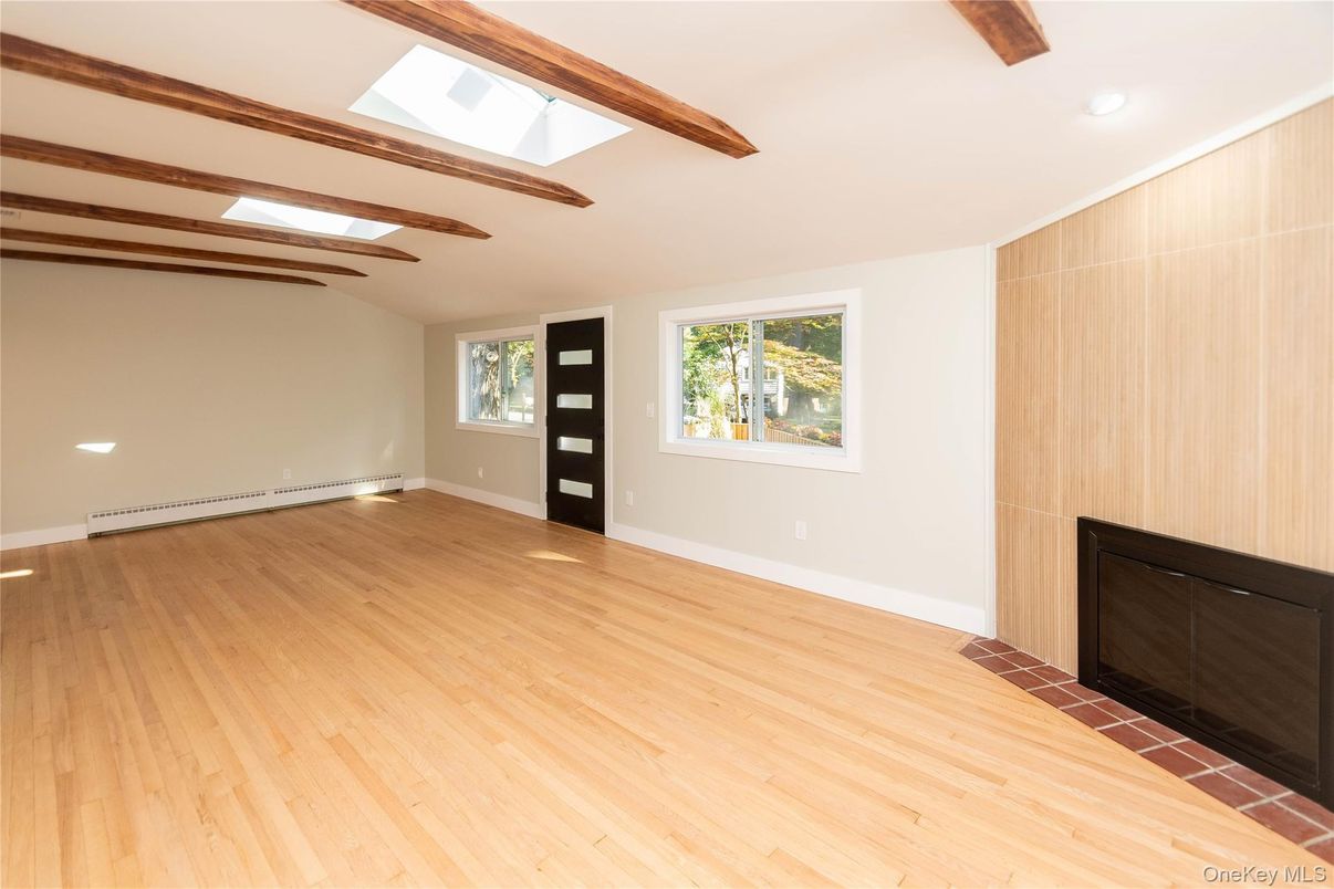 Empty room, Fireplace, Interior, Recessed Lighting, Wooden Beams, Wood Texture Flooring