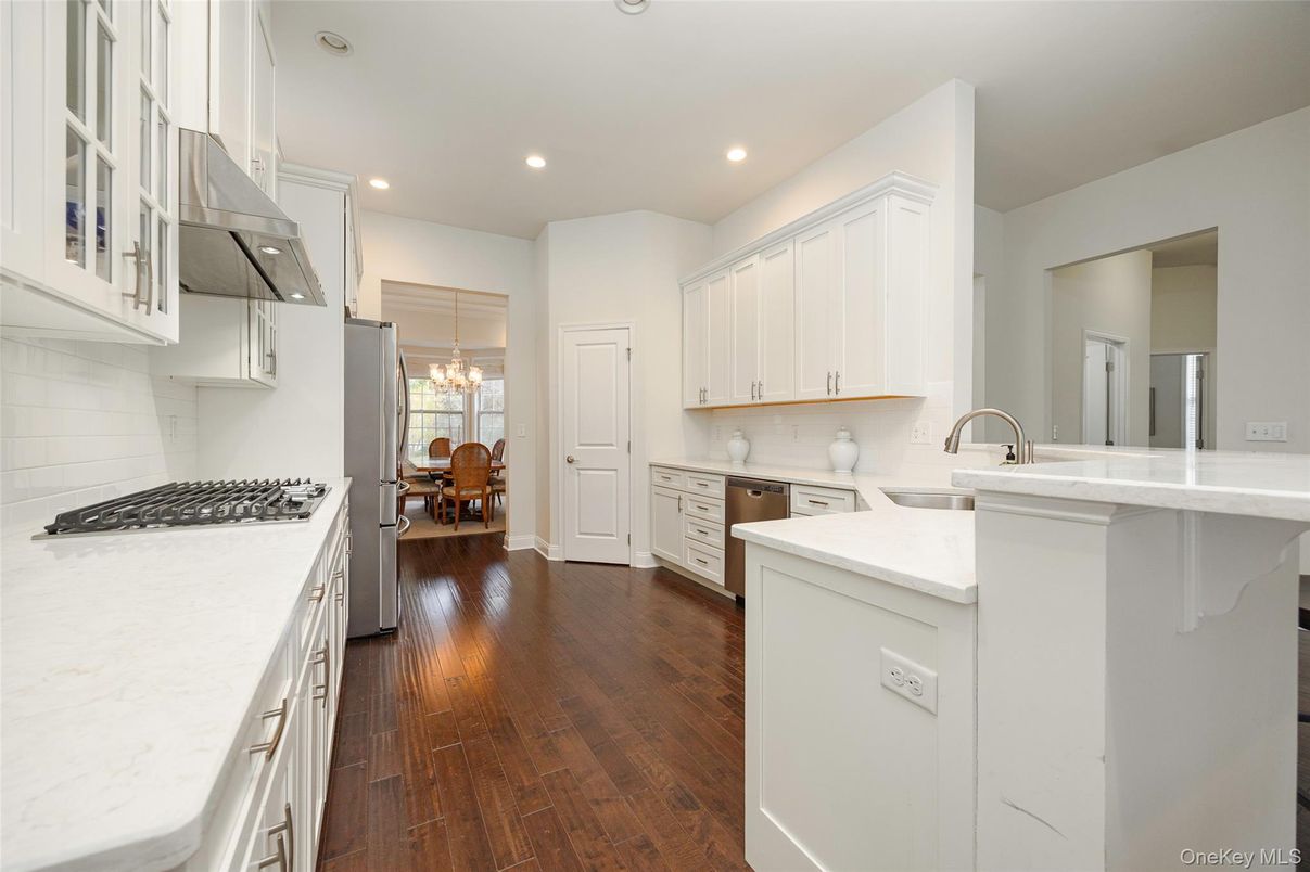 Chandelier, Dining room, Interior, Kitchen, Recessed Lighting, Stainless Steel Appliances, Wood Texture Flooring