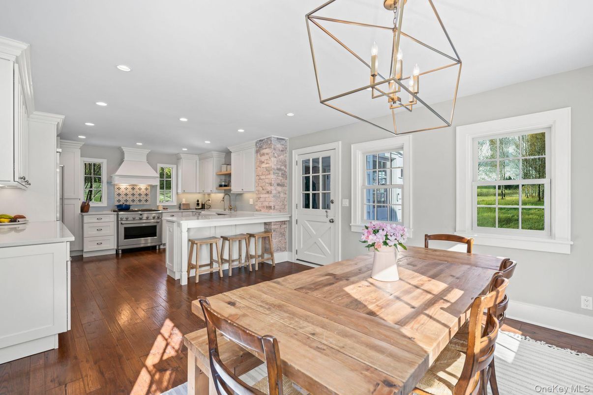 Dining room, Interior, Kitchen, Pendant Lights, Recessed Lighting, Stainless Steel Appliances, Wood Texture Flooring