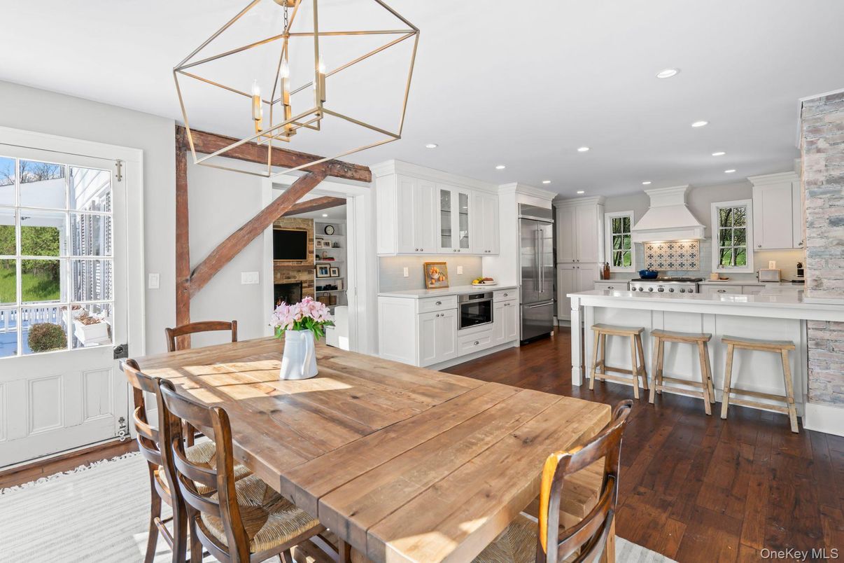 Dining room, Interior, Kitchen, Pendant Lights, Recessed Lighting, Stainless Steel Appliances, Wood Texture Flooring