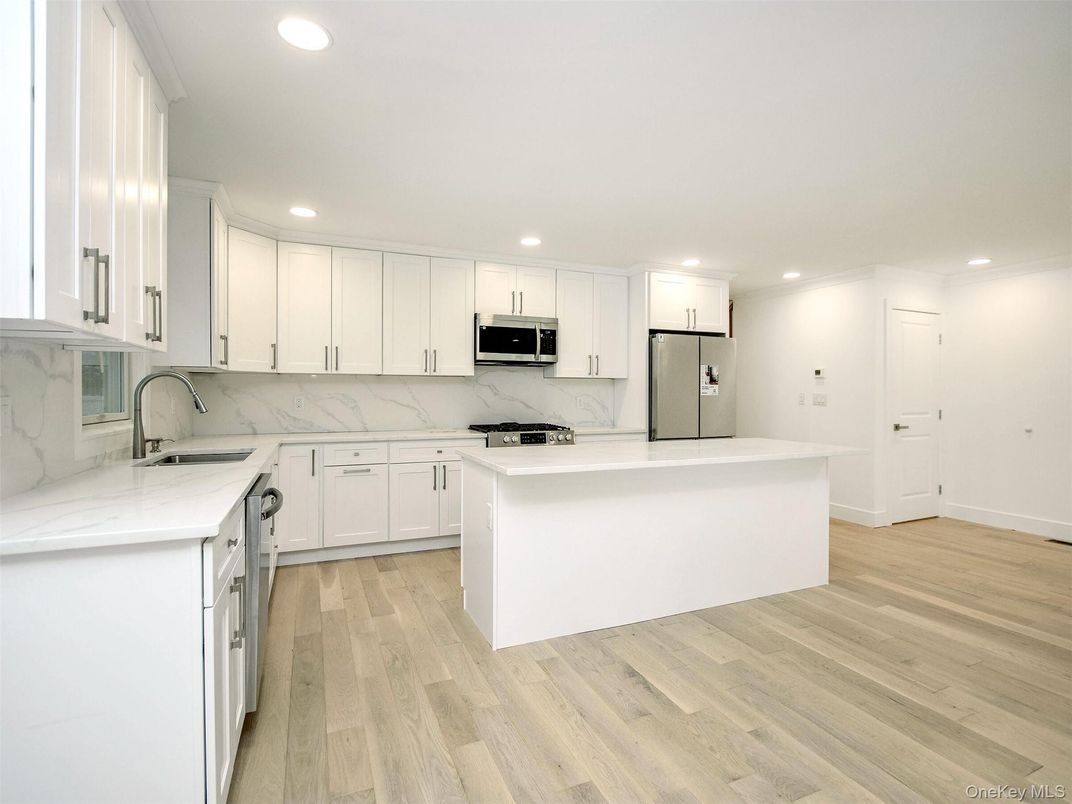 Interior, Kitchen, Marble Walls, Recessed Lighting, Wood Texture Flooring