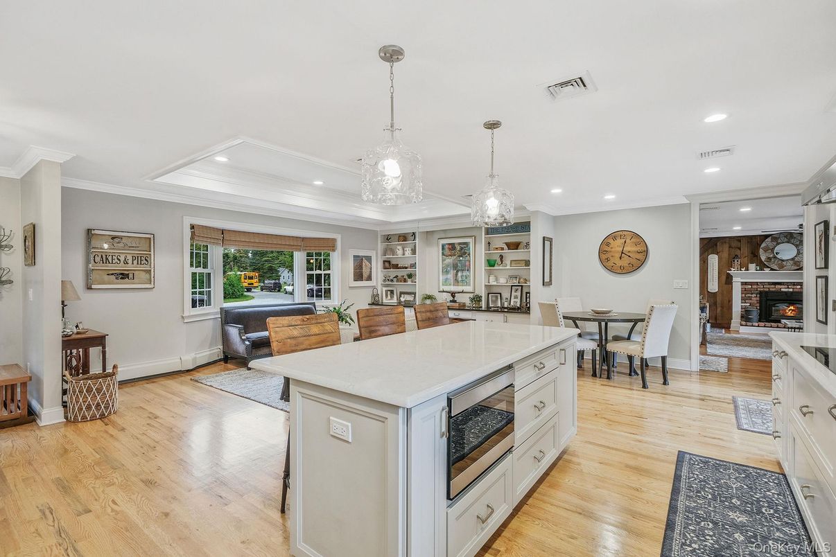 Dining room, Fireplace, Interior, Kitchen, Living room, Pendant Lights, Recessed Lighting, Wood Texture Flooring