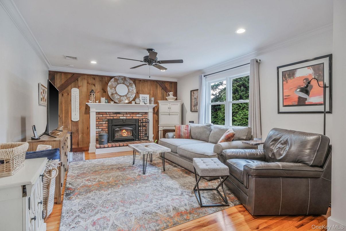 Fireplace, Interior, Living room, Recessed Lighting, Wood Texture Flooring, Wooden Walls