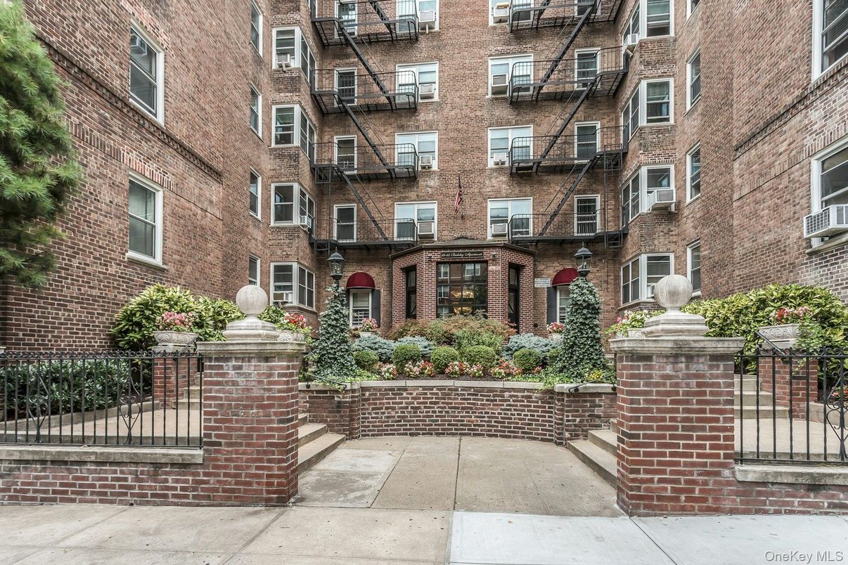 Exterior, Facade, Brick Facade, Condo Building