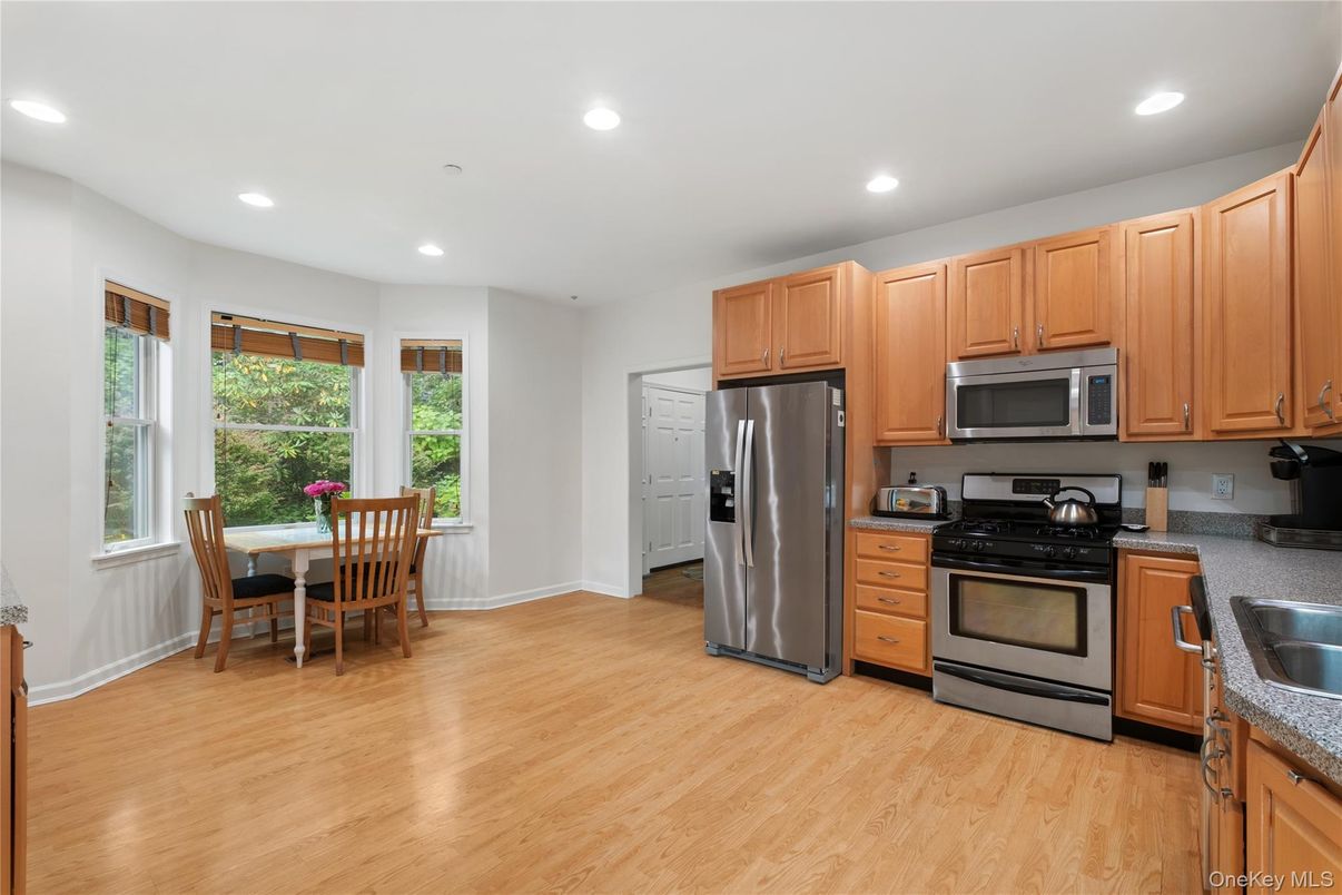 Dining room, Interior, Kitchen, Recessed Lighting, Stainless Steel Appliances, Wood Texture Flooring