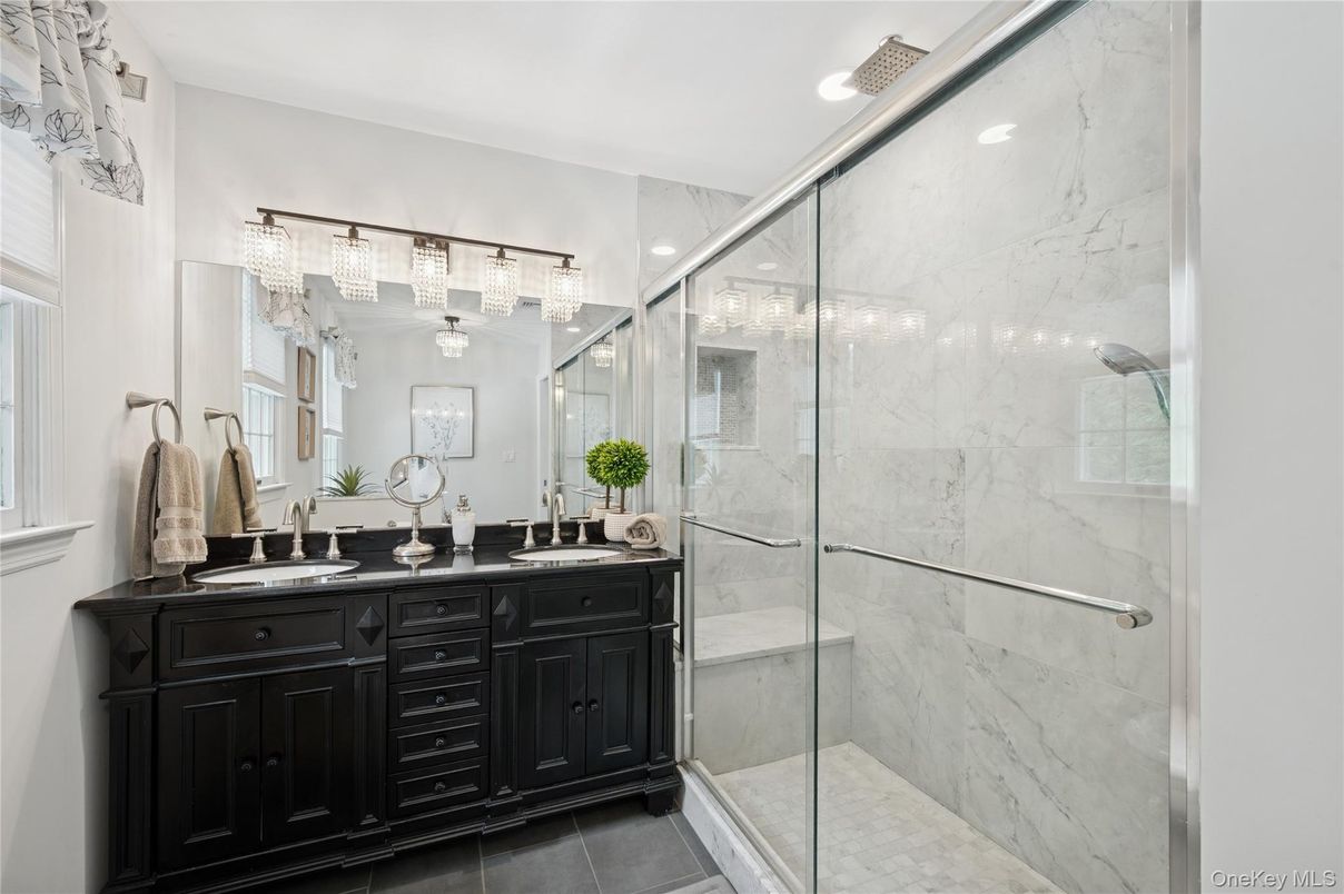 Bathroom, Dual Sink Vanities, Glass Shower, Interior, Marble Walls, Recessed Lighting