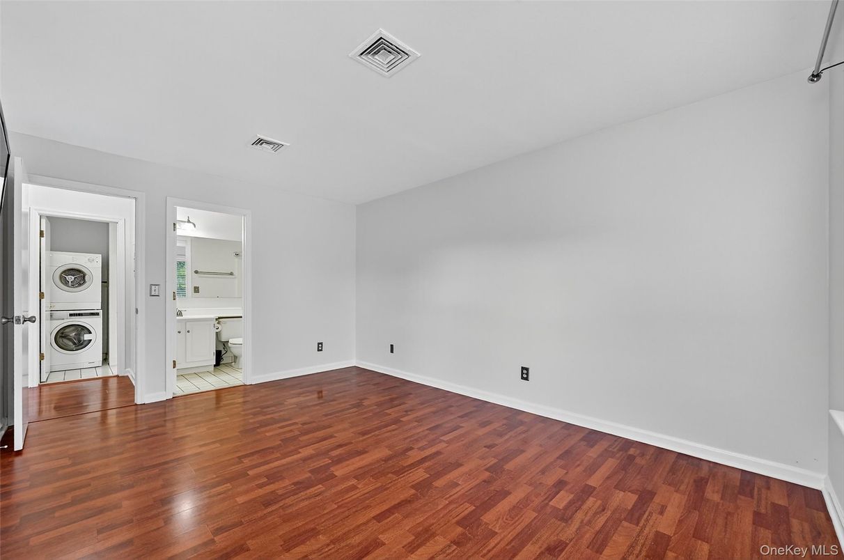 Empty room, Interior, Utility Closets, Washer, Wood Texture Flooring