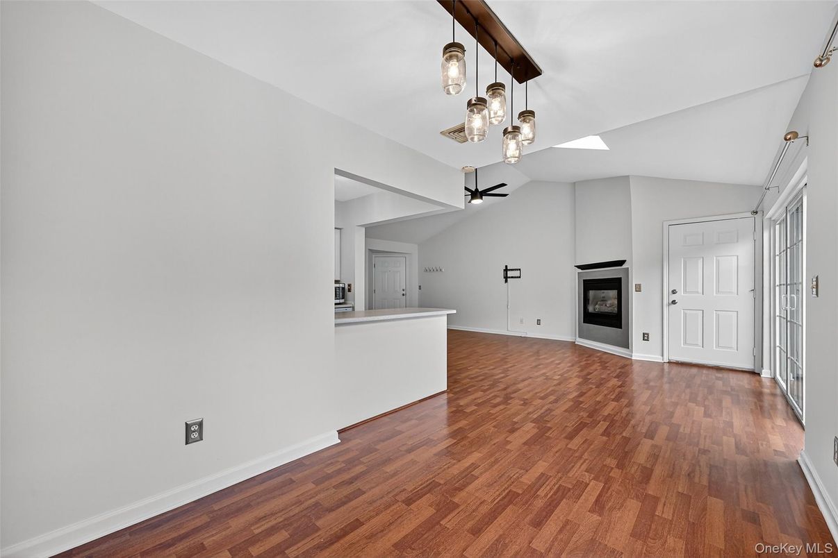 Empty room, Fireplace, Interior, Pendant Lights, Wood Texture Flooring