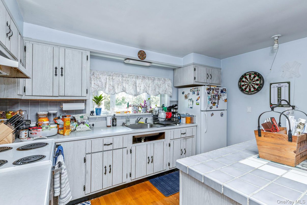 Interior, Kitchen, Tile Countertops, Wood Texture Flooring