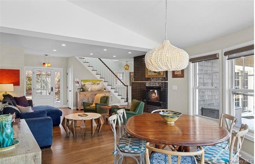 Dining room, Fireplace, Interior, Living room, Pendant Lights, Recessed Lighting, Stone Walls, Wood Texture Flooring