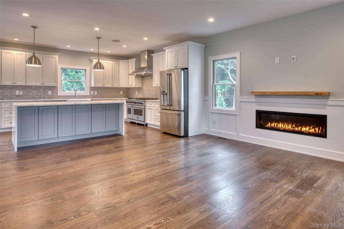 Fireplace, Interior, Kitchen, Pendant Lights, Recessed Lighting, Stainless Steel Appliances, Wood Texture Flooring