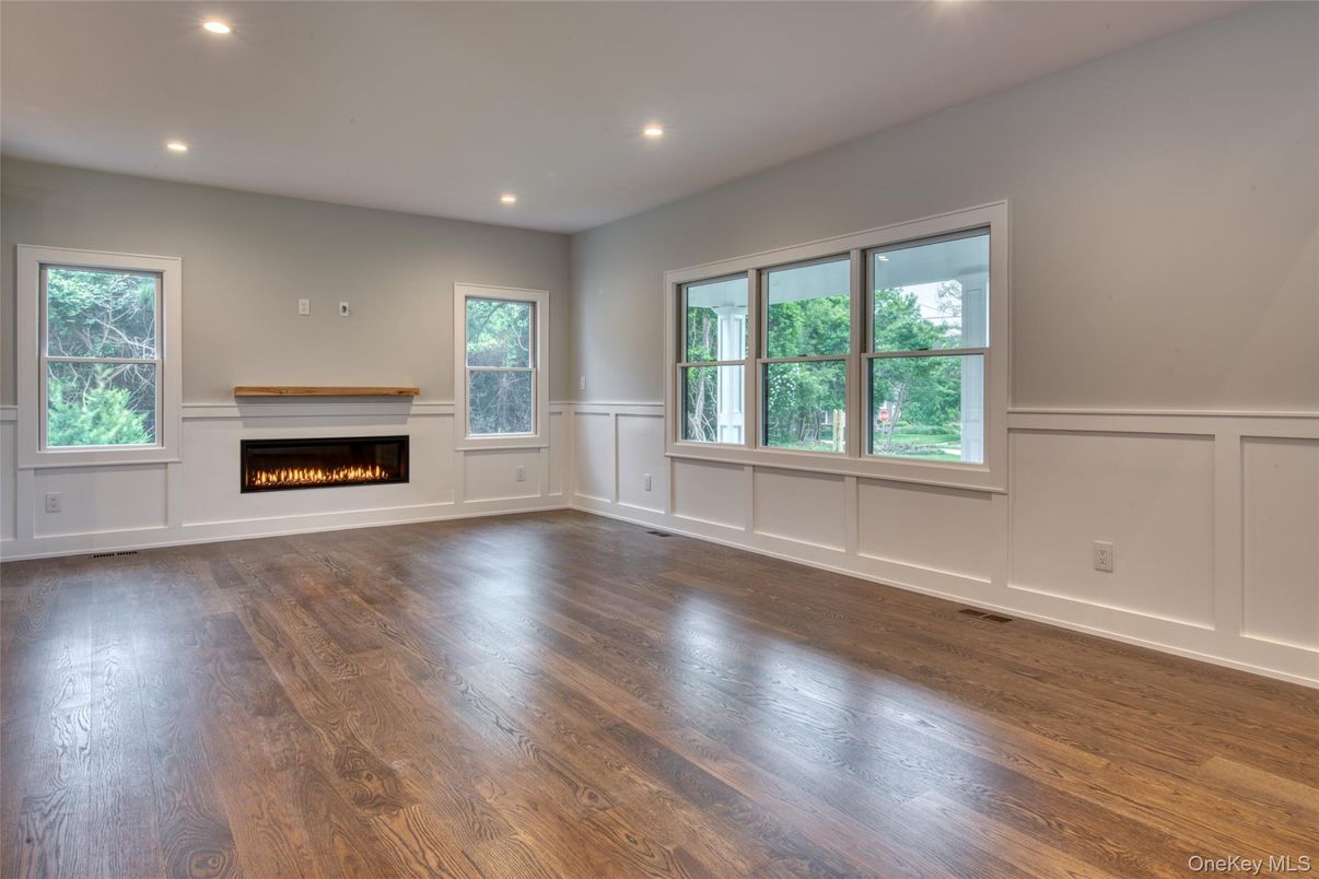 Empty room, Fireplace, Interior, Recessed Lighting, Wood Texture Flooring