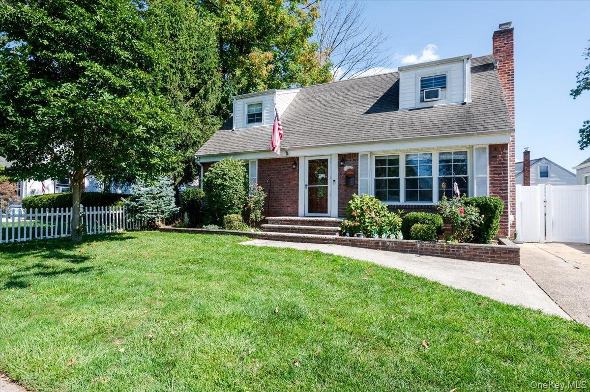 Exterior, Facade, Brick Facade, Cape Cod