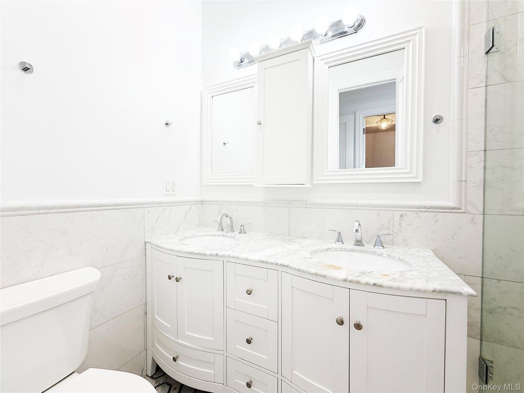Bathroom, Dual Sink Vanities, Glass Shower, Interior, Marble Walls
