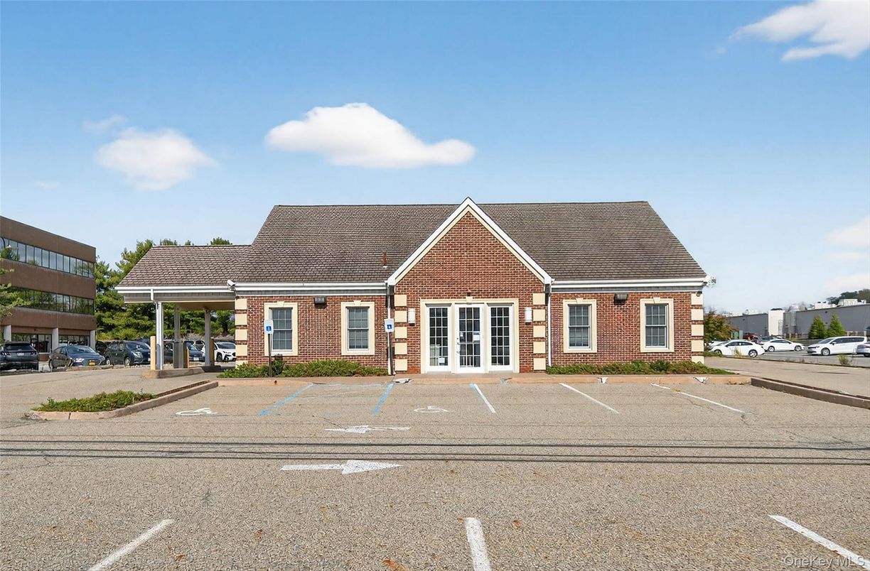 Exterior, Facade, Brick Facade, Cape Cod