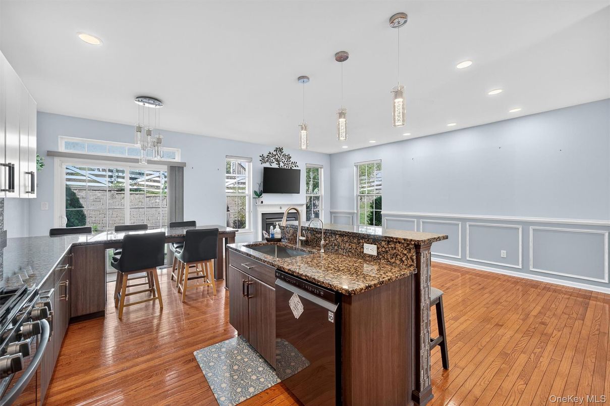 Dining room, Fireplace, Interior, Kitchen, Pendant Lights, Recessed Lighting, Wood Texture Flooring
