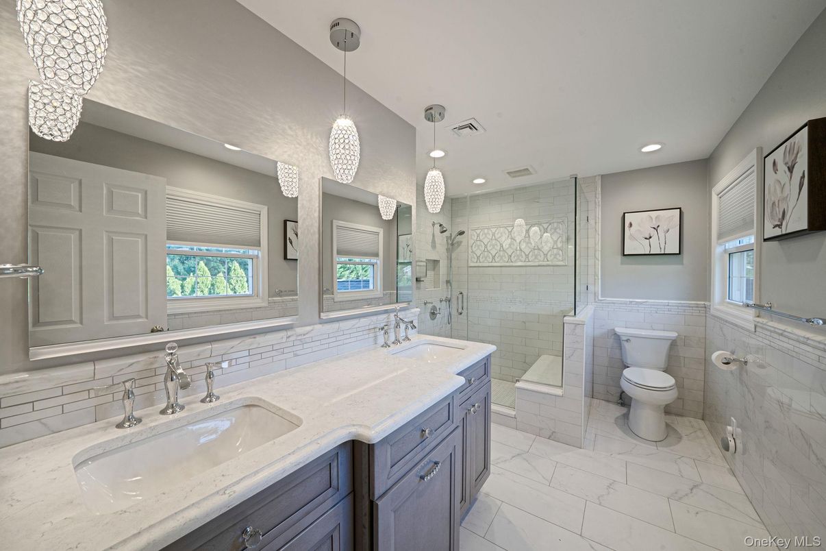 Bathroom, Dual Sink Vanities, Glass Shower, Interior, Marble, Pendant Lights, Recessed Lighting