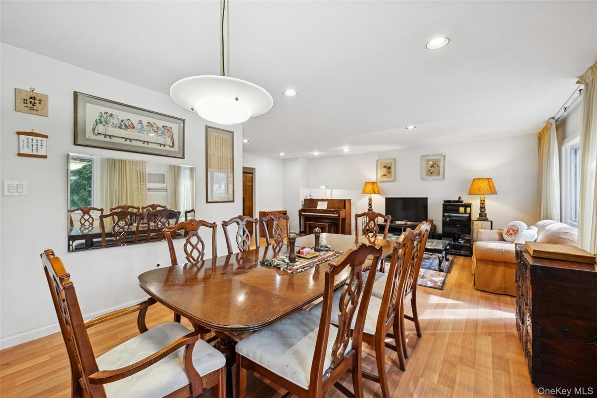 Dining room, Fireplace, Interior, Living room, Piano, Recessed Lighting, Wood Texture Flooring