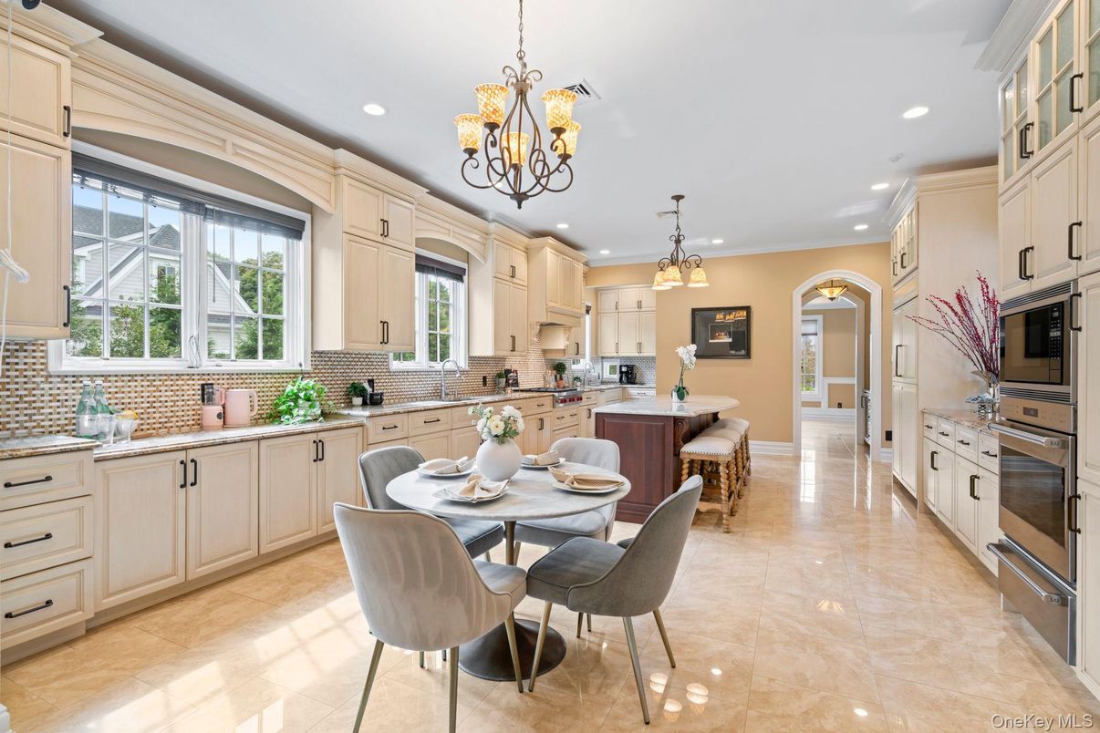Chandelier, Dining room, Interior, Kitchen, Pendant Lights, Recessed Lighting, Stainless Steel Appliances