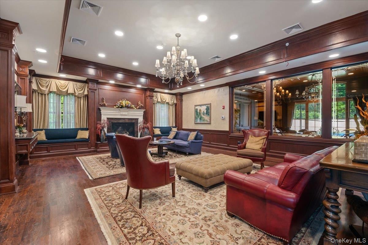Chandelier, Fireplace, Interior, Living room, Recessed Lighting, Wood Texture Flooring