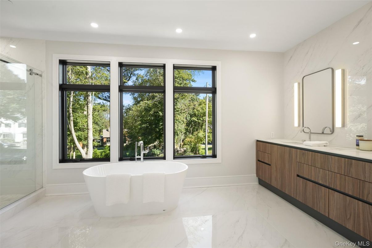 Bathroom, Dual Sink Vanities, Free Standing Baths, Glass Shower, Interior, Marble, Marble Walls, Recessed Lighting