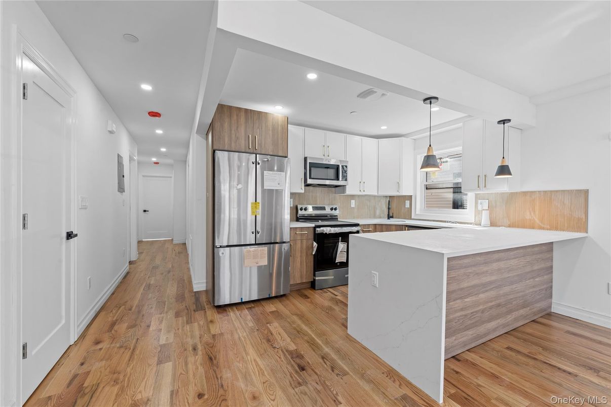 Interior, Kitchen, Pendant Lights, Recessed Lighting, Stainless Steel Appliances, Wood Texture Flooring