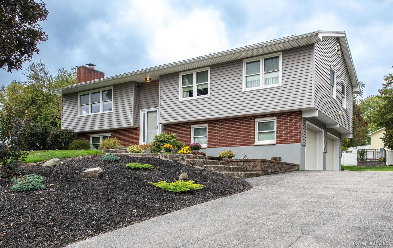 Attached, Exterior, Facade, Brick Facade, Raised Ranch