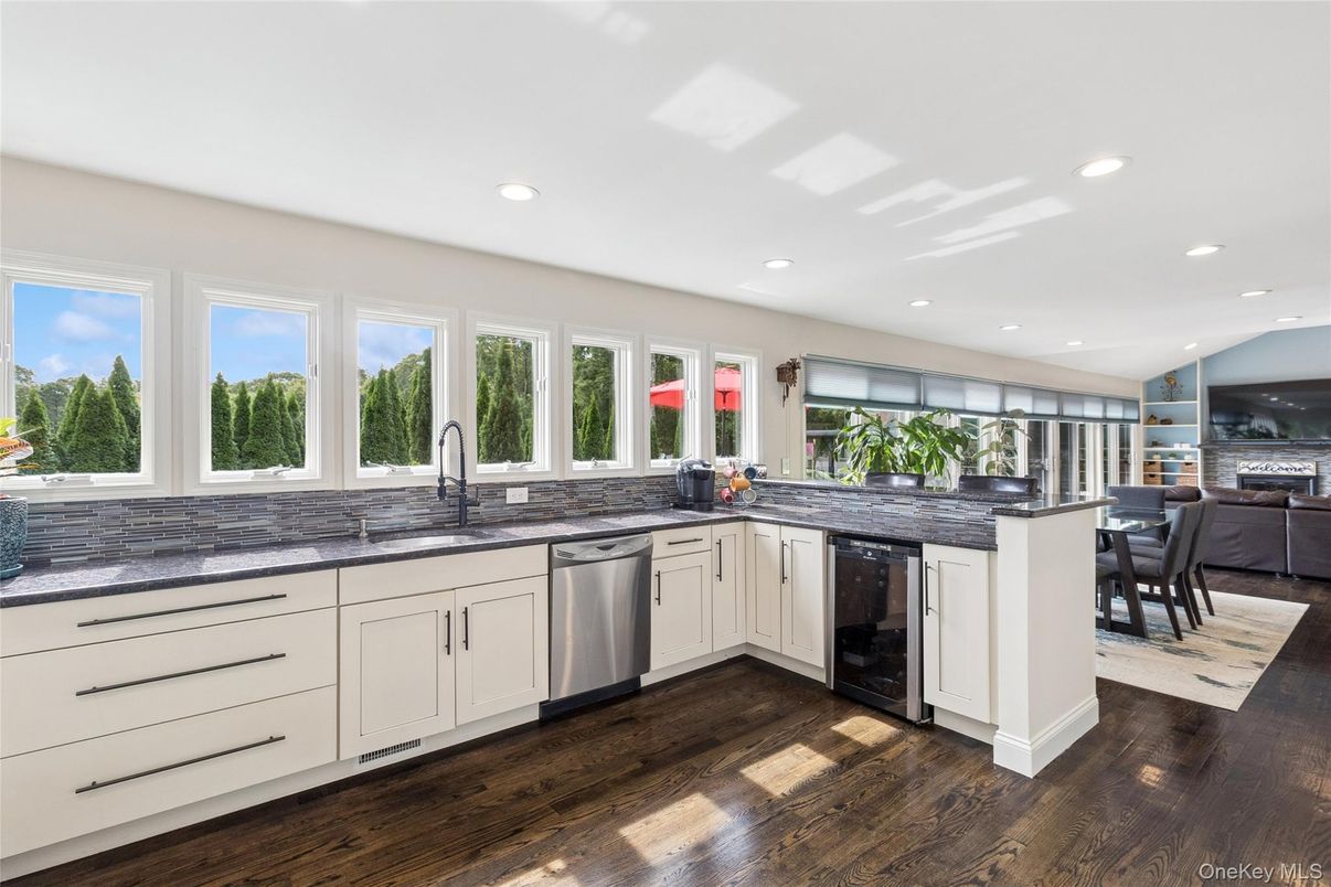 Dining room, Interior, Kitchen, Recessed Lighting, Stainless Steel Appliances, Wood Texture Flooring