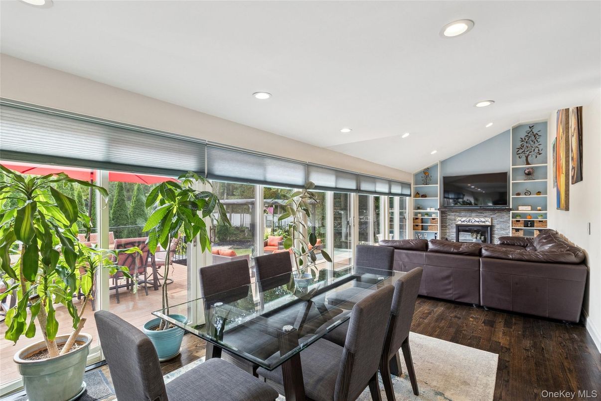 Dining room, Fireplace, Interior, Living room, Recessed Lighting, Wood Texture Flooring