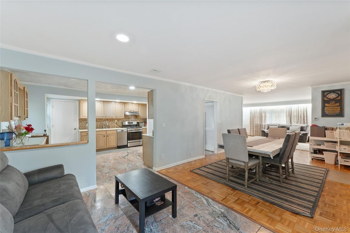 Chandelier, Dining room, Interior, Kitchen, Recessed Lighting, Stainless Steel Appliances, Wood Texture Flooring